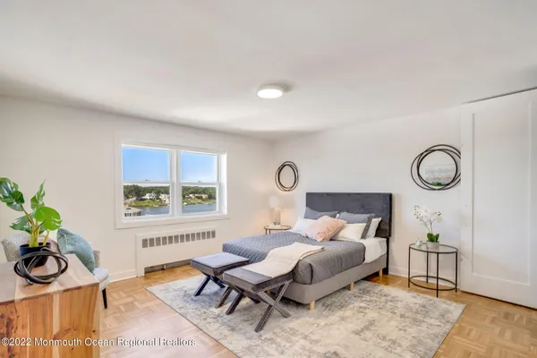a view of lobby with furniture and a large window