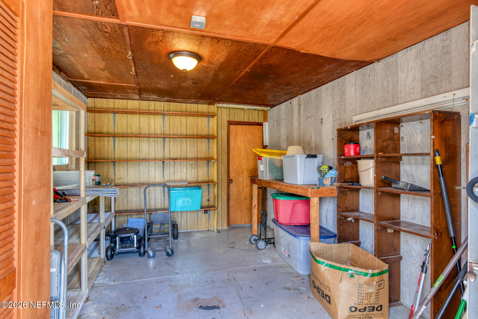 115 Sunset Point Road East Palatka, FL 32131 - Photo 57 of 64 workshop in garage building