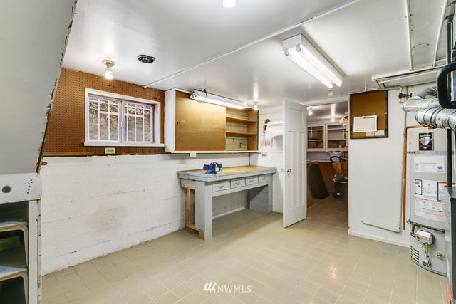 a view of a kitchen with furniture and window