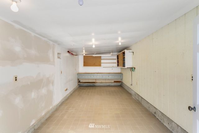 a view of room with stairs and a window