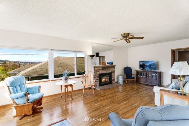 a living room with furniture or fireplace and a flat screen tv