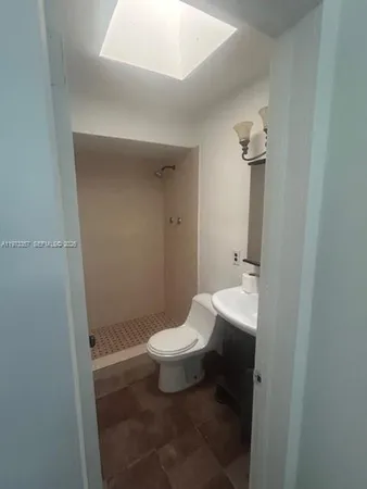 a bathroom with a toilet