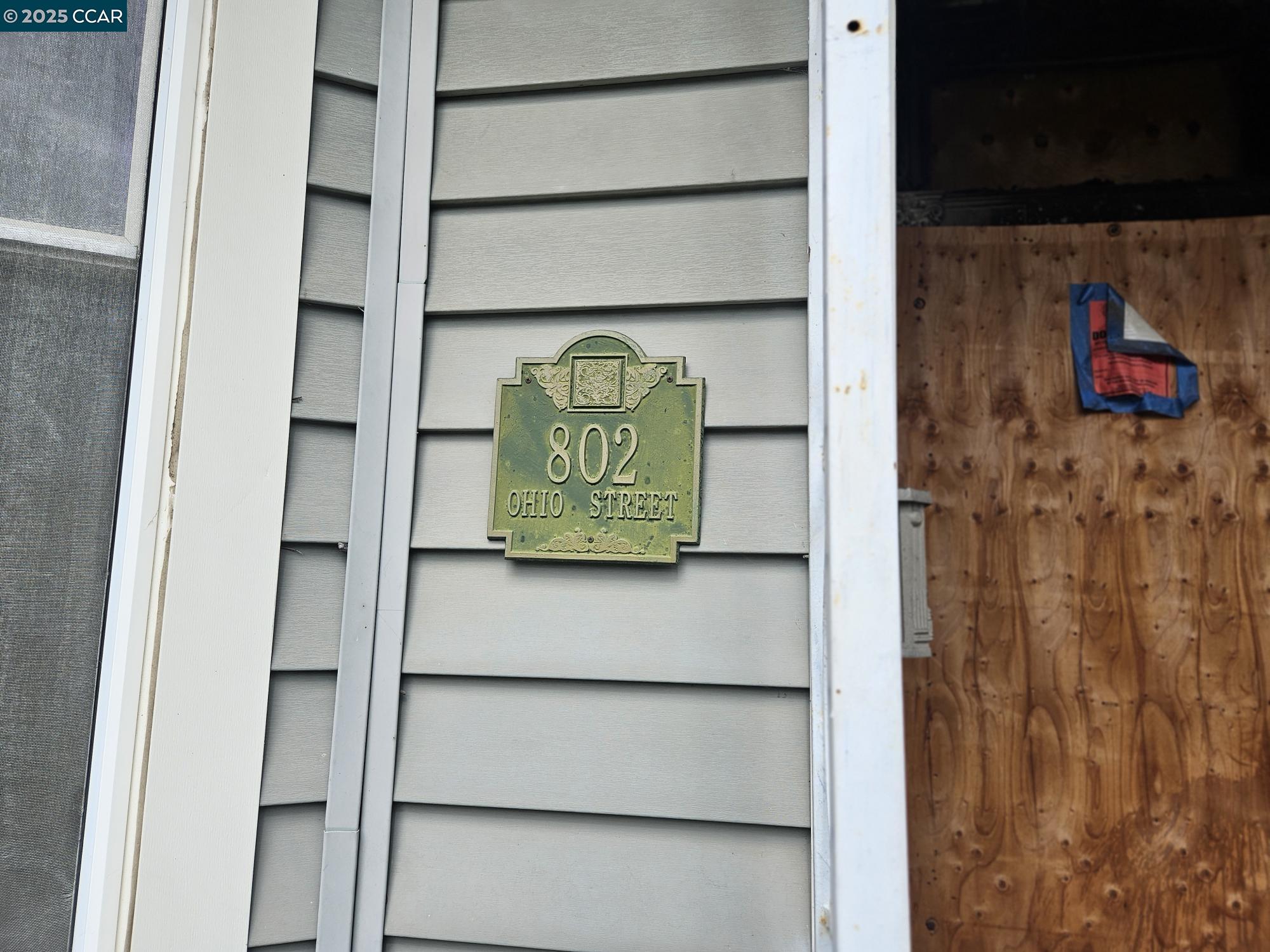 802 Ohio Street Vallejo, CA 94590 - Photo 3 of 14 a sign that is on a wall