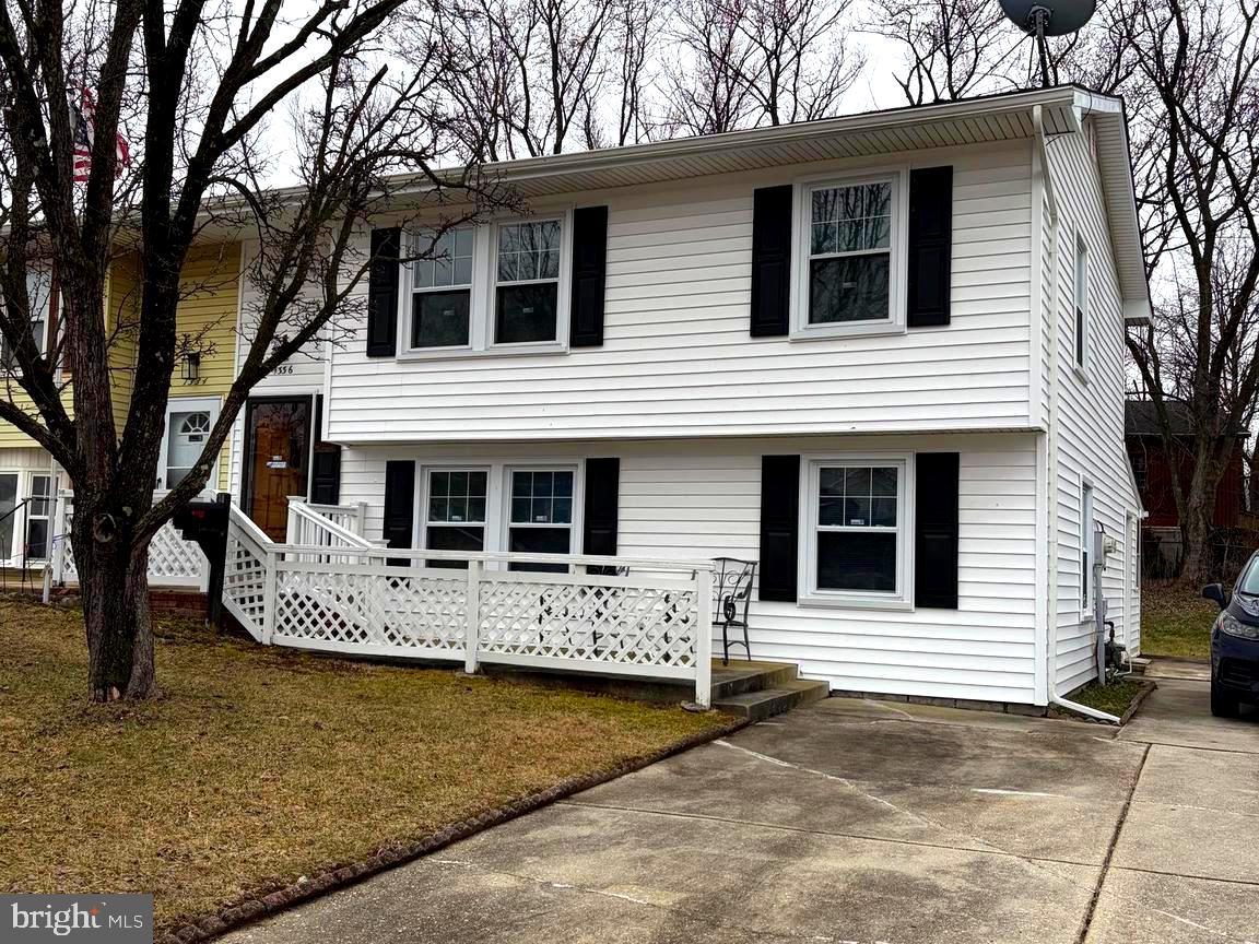 1336 Passage Drive Odenton, MD 21113 - Photo 1 of 14 a front view of a house with a porch