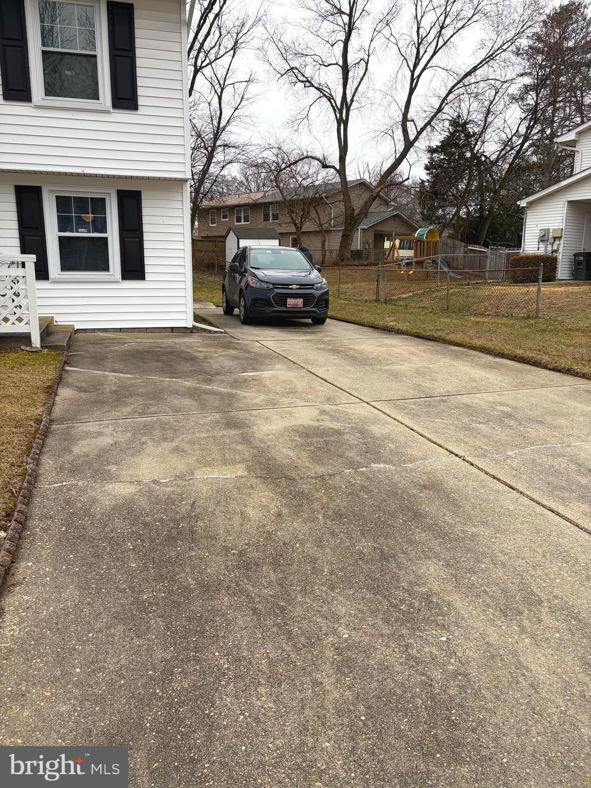 1336 Passage Drive Odenton, MD 21113 - Photo 3 of 14 a view of a car parked on the side of a road