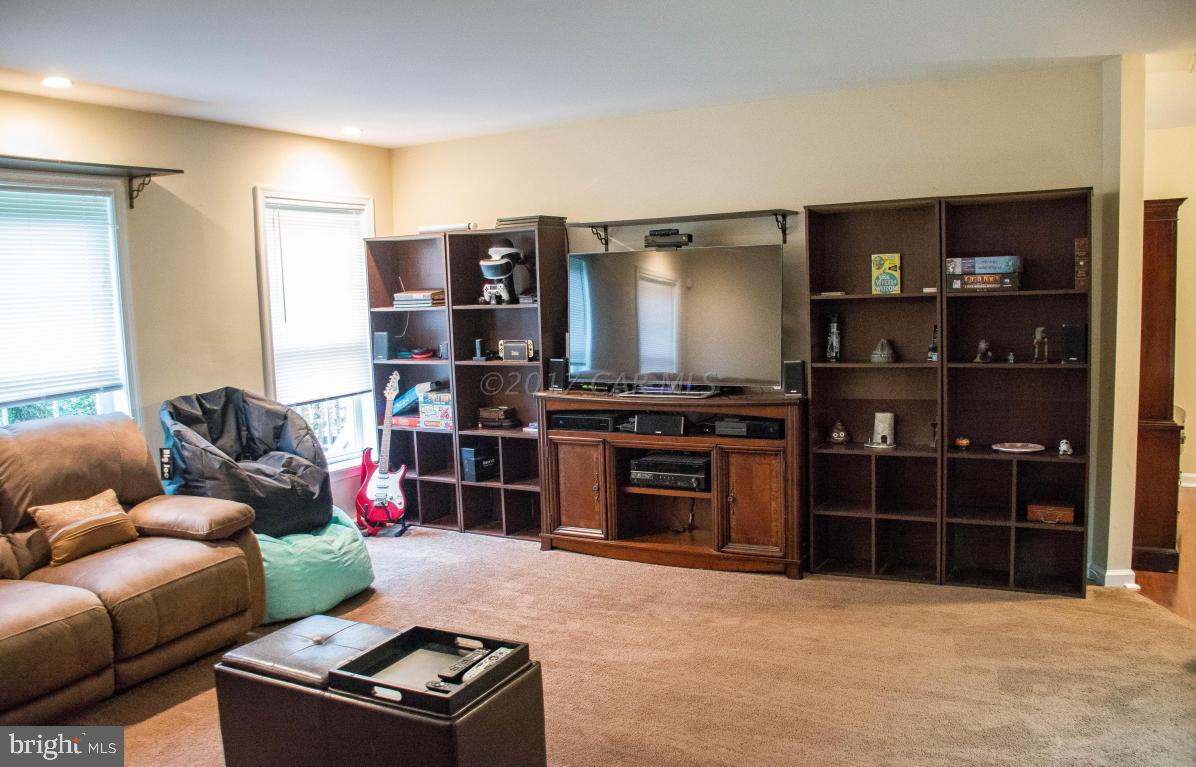 9703 Peerless Road Bishopville, MD 21813 - Photo 22 of 37 a living room with furniture