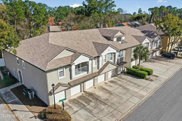 an aerial view of a house with garden