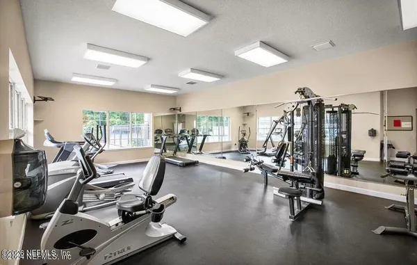 a view of a room with gym equipment