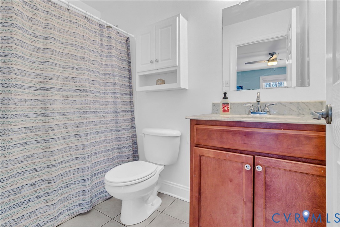 43 Ruddy Duck Road Heathsville, VA 22473 - Photo 19 of 46 a bathroom with a sink a toilet and mirror