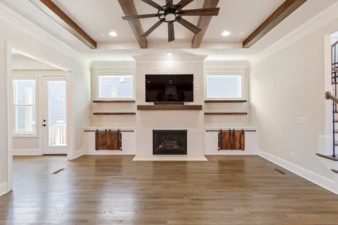 a bedroom with furniture and window