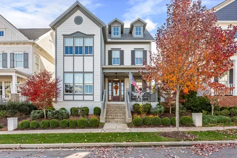 front view of a house with a small yard
