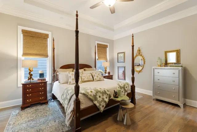 a bathroom with a granite countertop sink mirror toilet and shower