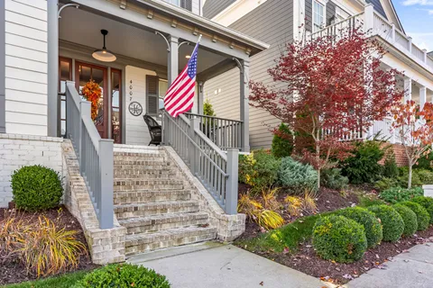 a view of entryway with stairs and wooden floor