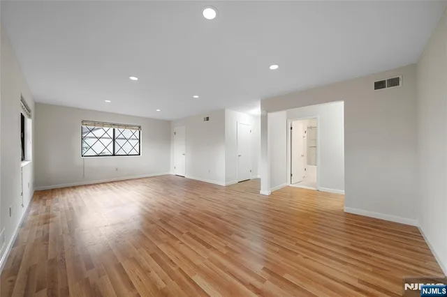 a view of an empty room and window