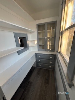 14 Guilfoile Street, Unit 2 Waterbury, CT 06708 - Photo 7 of 17 a bathroom with a bathtub and a window