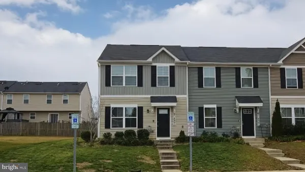 a front view of house with yard