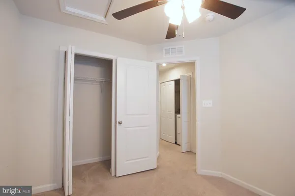 an empty room with a bathroom