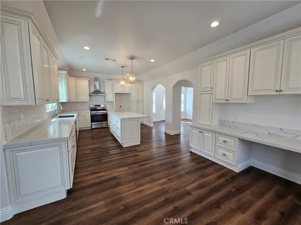 a large kitchen with cabinets