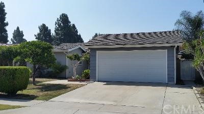 10848 Andy Street Cerritos, CA 90703 - Photo 1 of 1 a front view of a house with a yard and garage