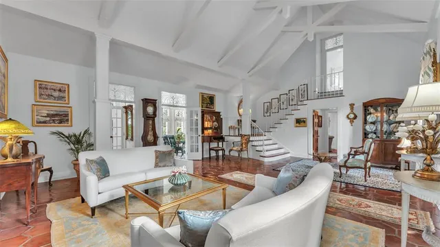 a living room with furniture and a table