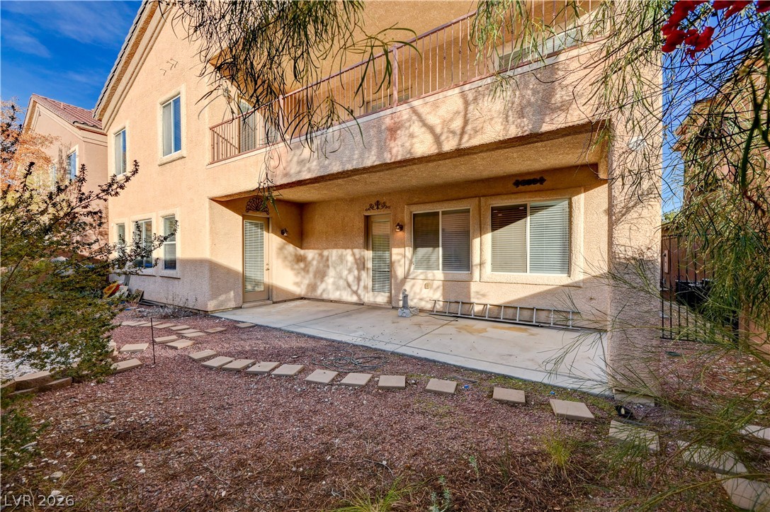 6761 Clay TABLET Street Las Vegas, NV 89149 - Photo 68 of 73 An inviting covered concrete patio provides shade and transitions smoothly to the gravel backyard.
