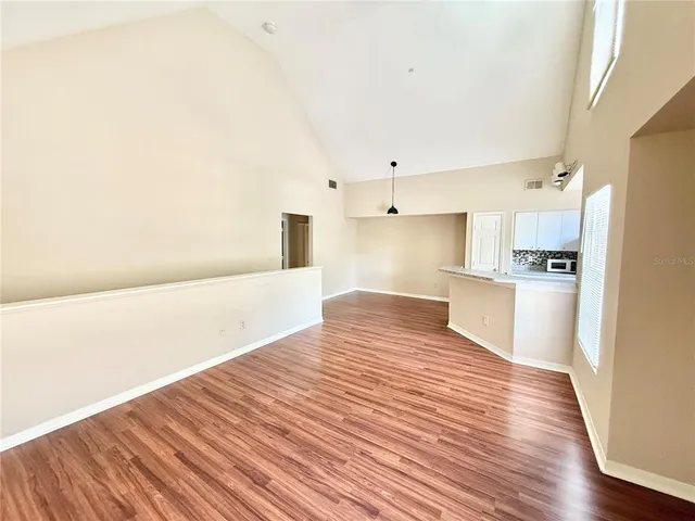 a view of kitchen with wooden floor