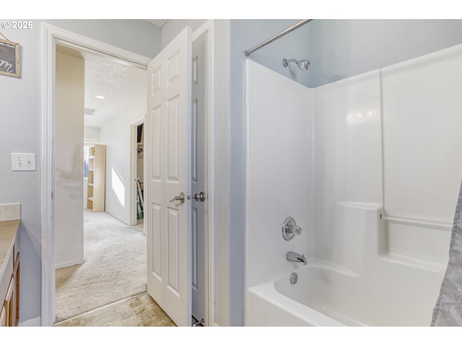 147 Southwest Wright Avenue Troutdale, OR 97060 - Photo 26 of 27 a bathroom with a bathtub shower and a sink