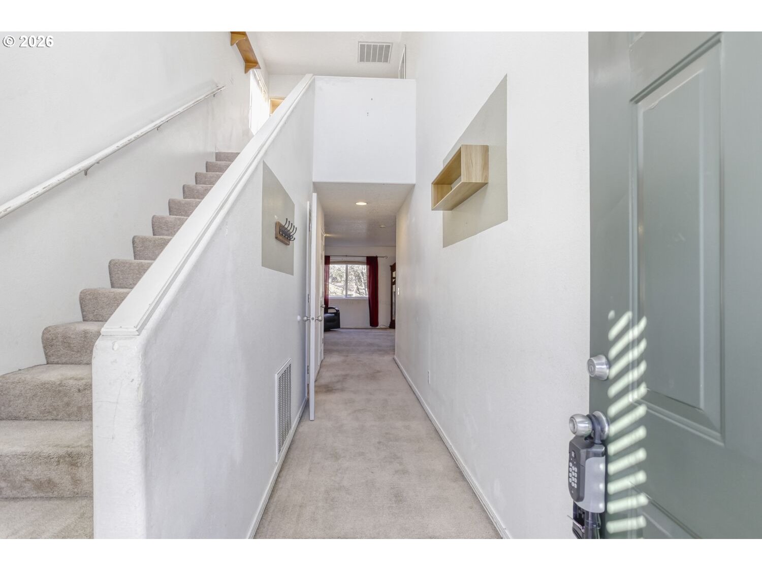 147 Southwest Wright Avenue Troutdale, OR 97060 - Photo 3 of 27 a view of a hallway with stairs