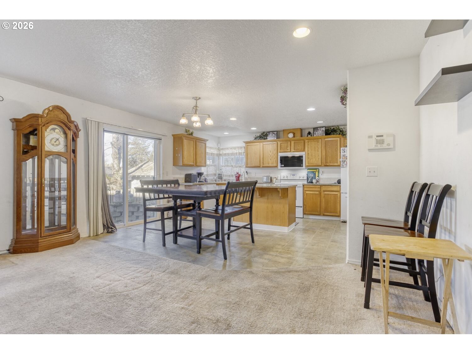 147 Southwest Wright Avenue Troutdale, OR 97060 - Photo 5 of 27 a view of a dining room with furniture and chandelier