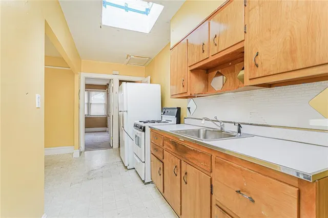 a bathroom with a bathtub a toilet and a sink