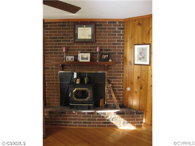 5406 Pineland Road Richmond, VA 23234 - Photo 12 of 12 Den/Family/Great Room - Brick fireplace in Den