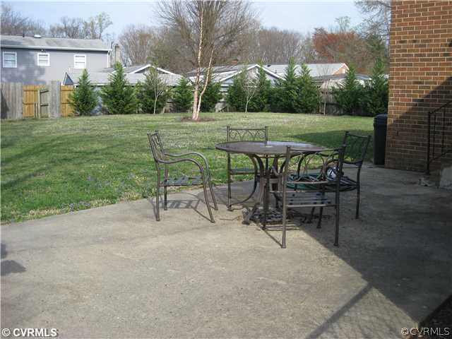 5406 Pineland Road Richmond, VA 23234 - Photo 2 of 12 Patio/Deck - Cement Patio with stationary grill an