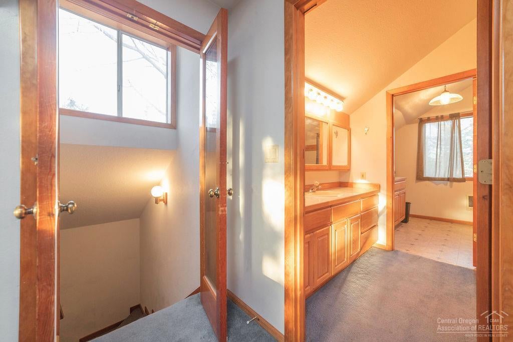 63367 O. B. Riley Road Bend, OR 97703 - Photo 22 of 24 Apartment upstairs entrance and bathroom