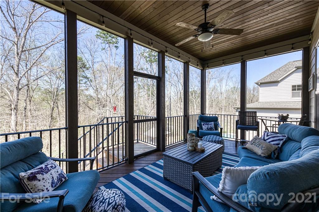 133 Forsythia Lane Tega Cay, SC 29708 - Photo 41 of 48 a living room with furniture and a large window