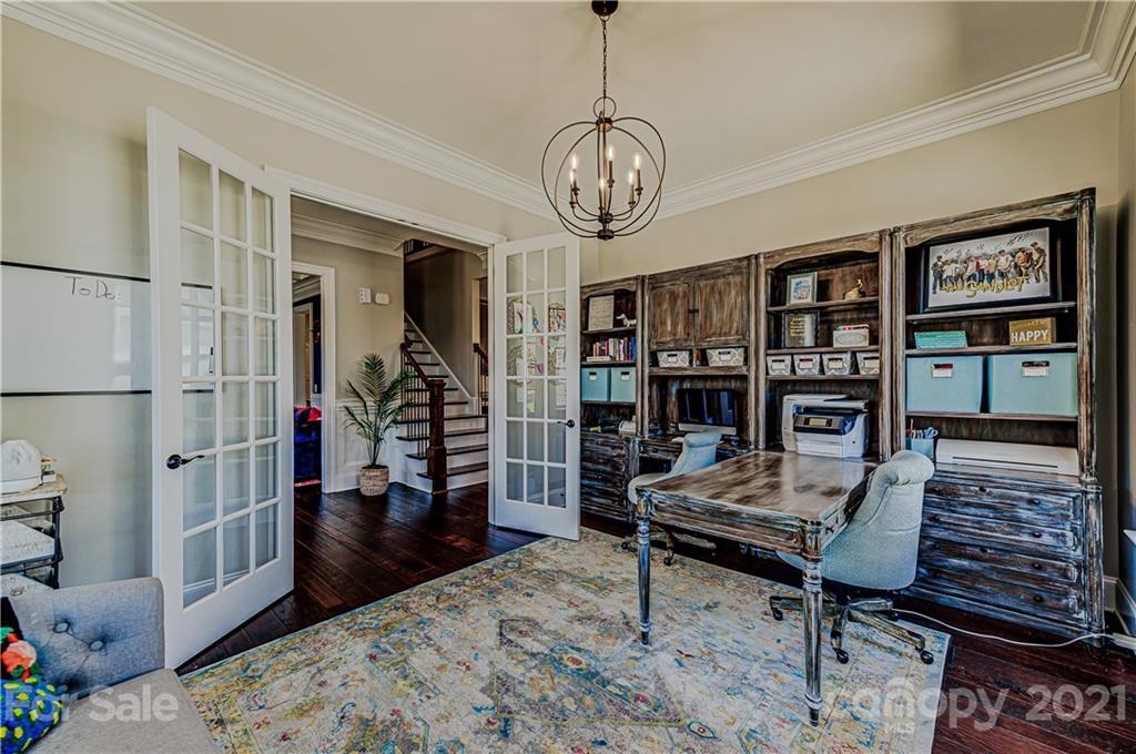 133 Forsythia Lane Tega Cay, SC 29708 - Photo 6 of 48 a living room with lots of furniture and wooden floor