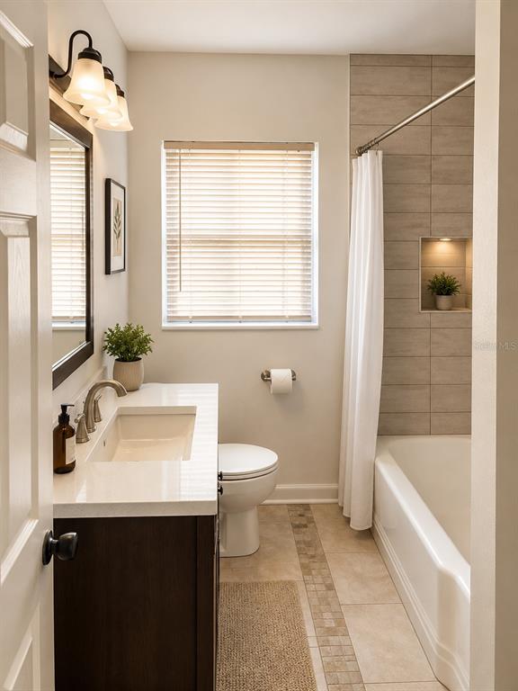 1559 Barry Road Clearwater, FL 33756 - Photo 13 of 20 a bathroom with a sink toilet and shower