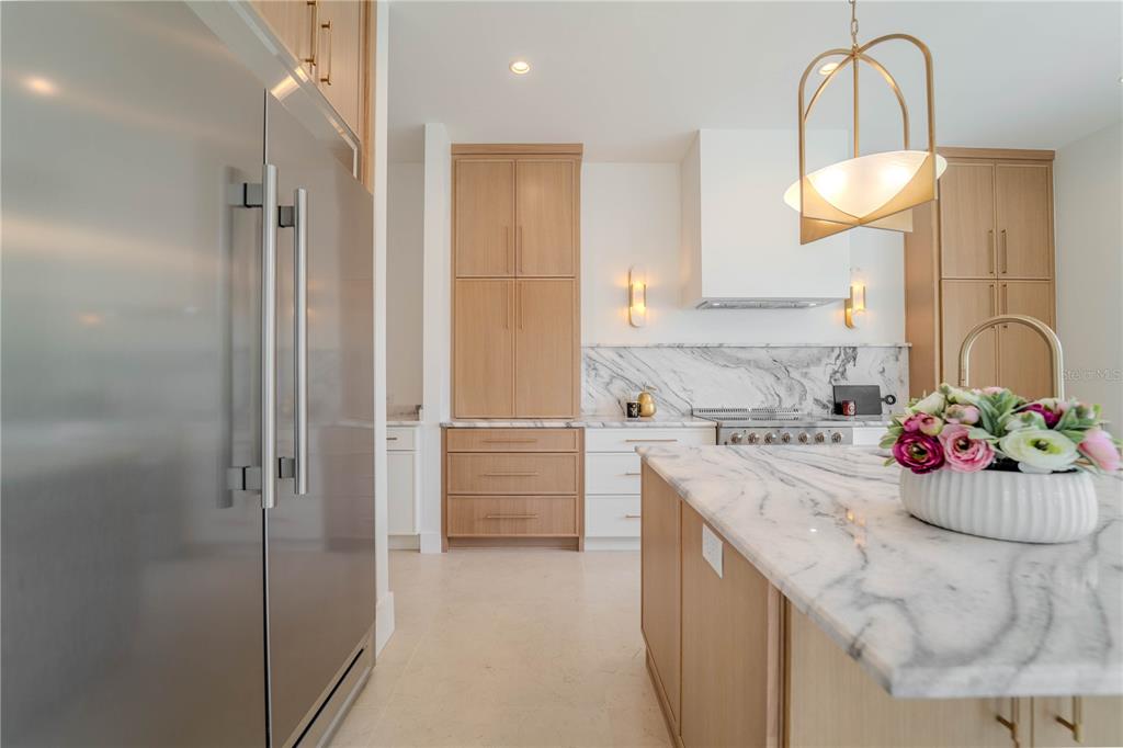 4502 South Shamrock Road Tampa, FL 33611 - Photo 16 of 41 a kitchen with a sink and cabinets