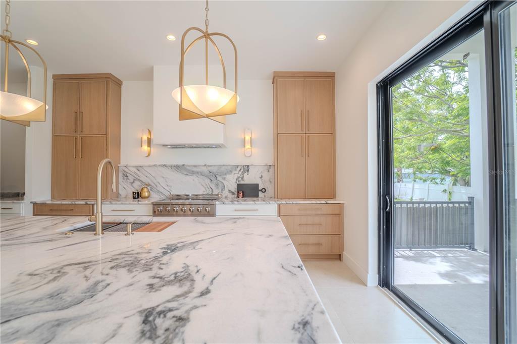4502 South Shamrock Road Tampa, FL 33611 - Photo 20 of 41 a spacious bathroom with a double vanity sink and a mirror
