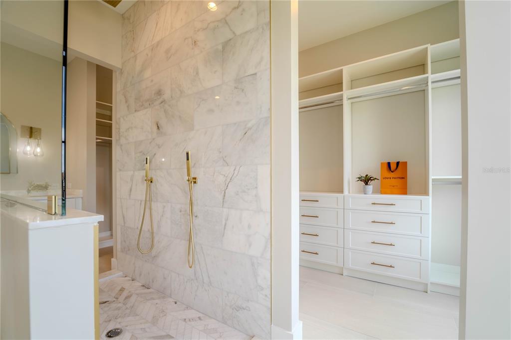 4502 South Shamrock Road Tampa, FL 33611 - Photo 36 of 41 a bathroom with a shower and a sink