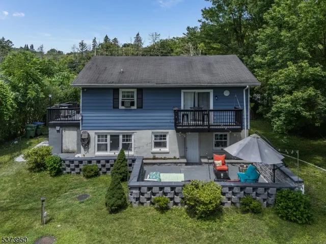 an aerial view of a house yard and balcony