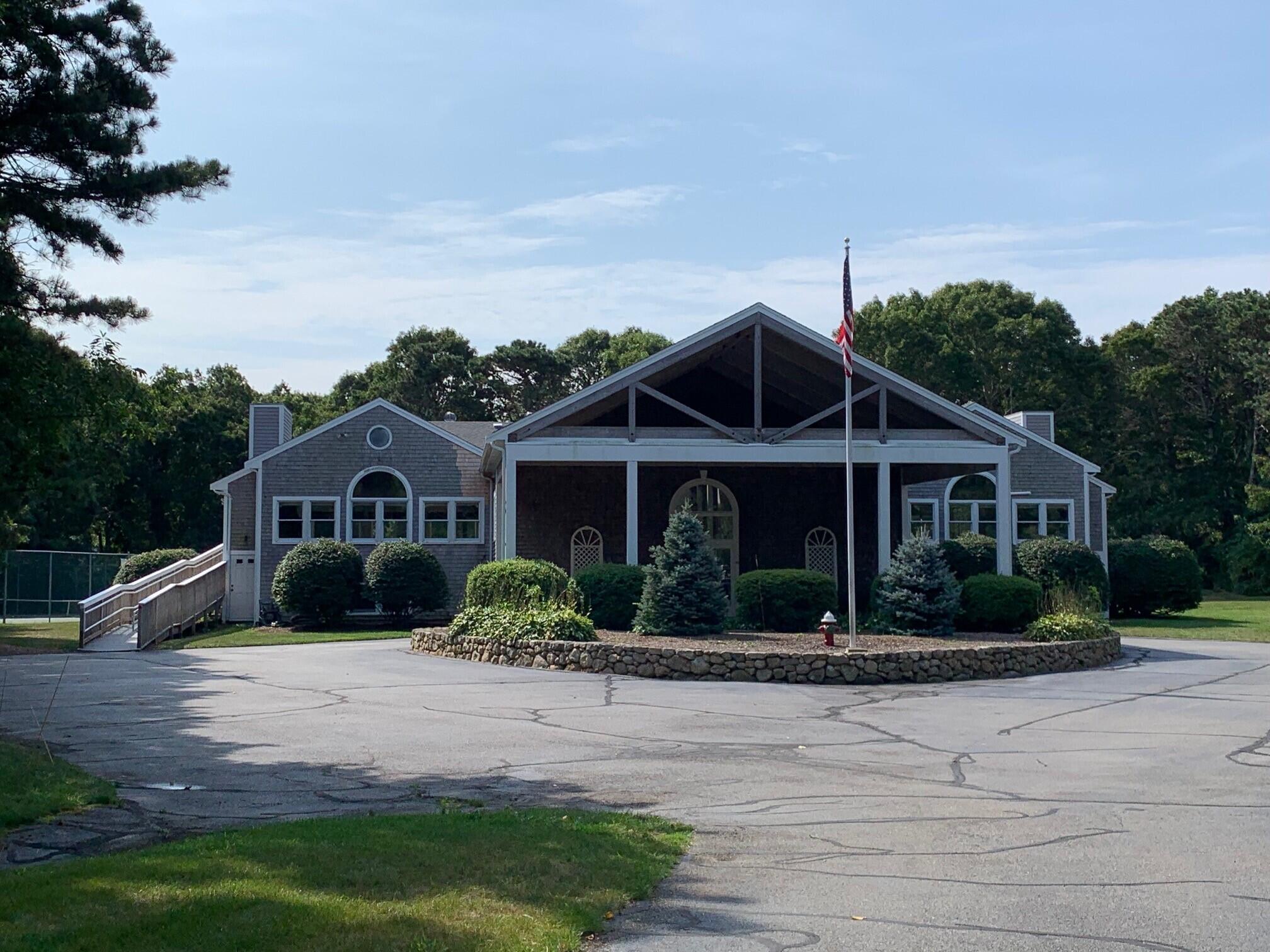 16 Skipjack Lane Hyannis, MA 02601 - Photo 35 of 39 a front view of a house with a yard