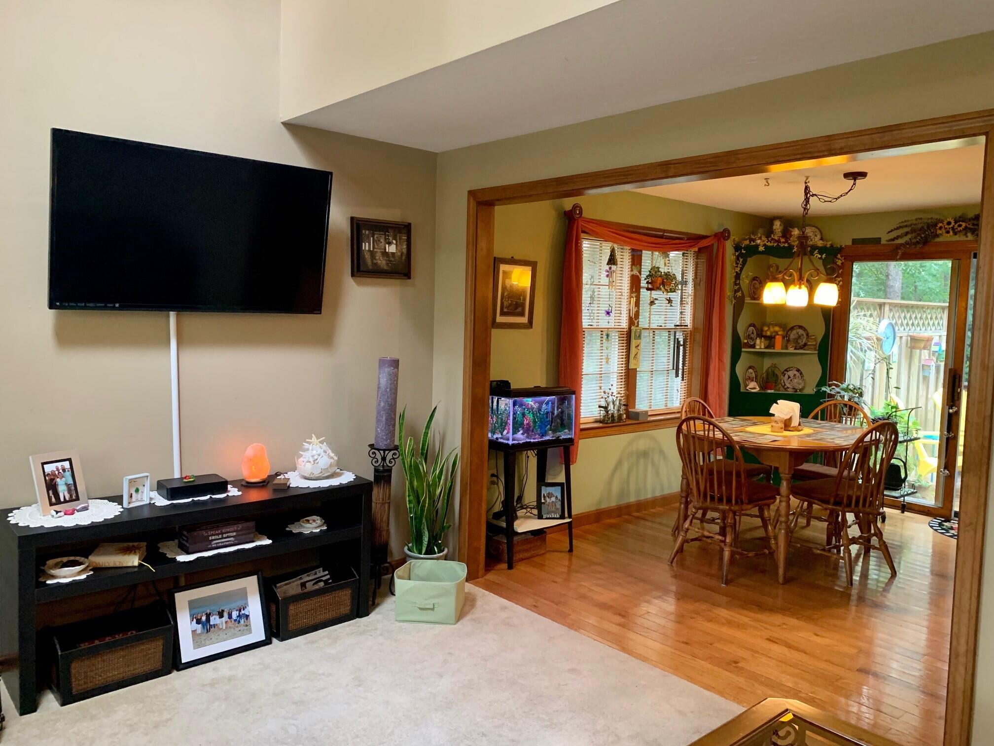 16 Skipjack Lane Hyannis, MA 02601 - Photo 6 of 39 a living room with furniture and a flat screen tv