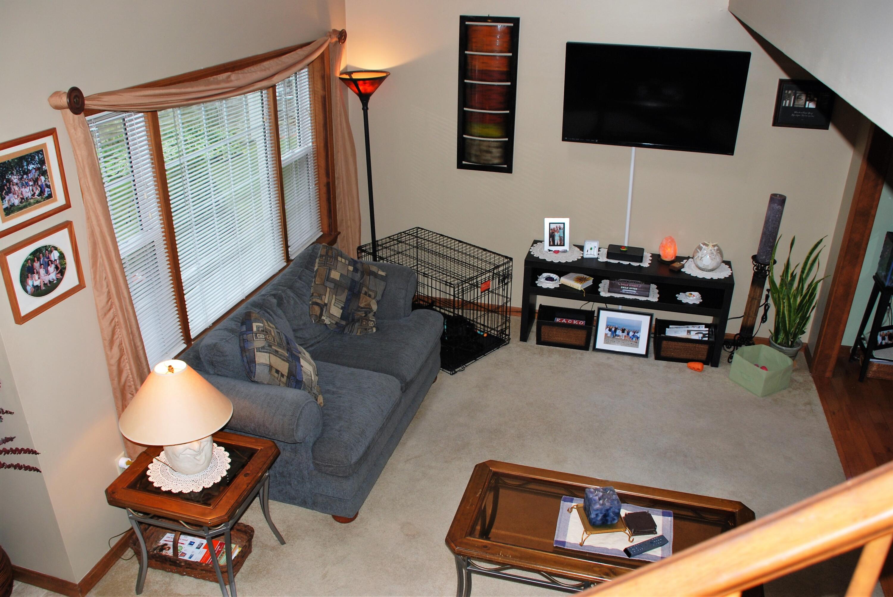 16 Skipjack Lane Hyannis, MA 02601 - Photo 7 of 39 a living room with furniture and a flat screen tv