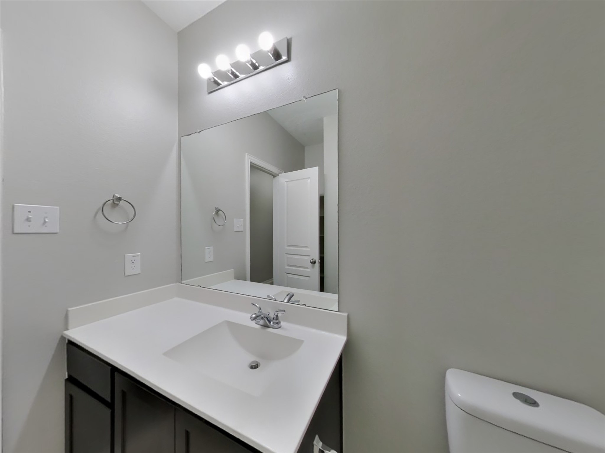 210 Pequin Road Crosby, TX 77532 - Photo 15 of 18 a bathroom with a sink vanity and a mirror