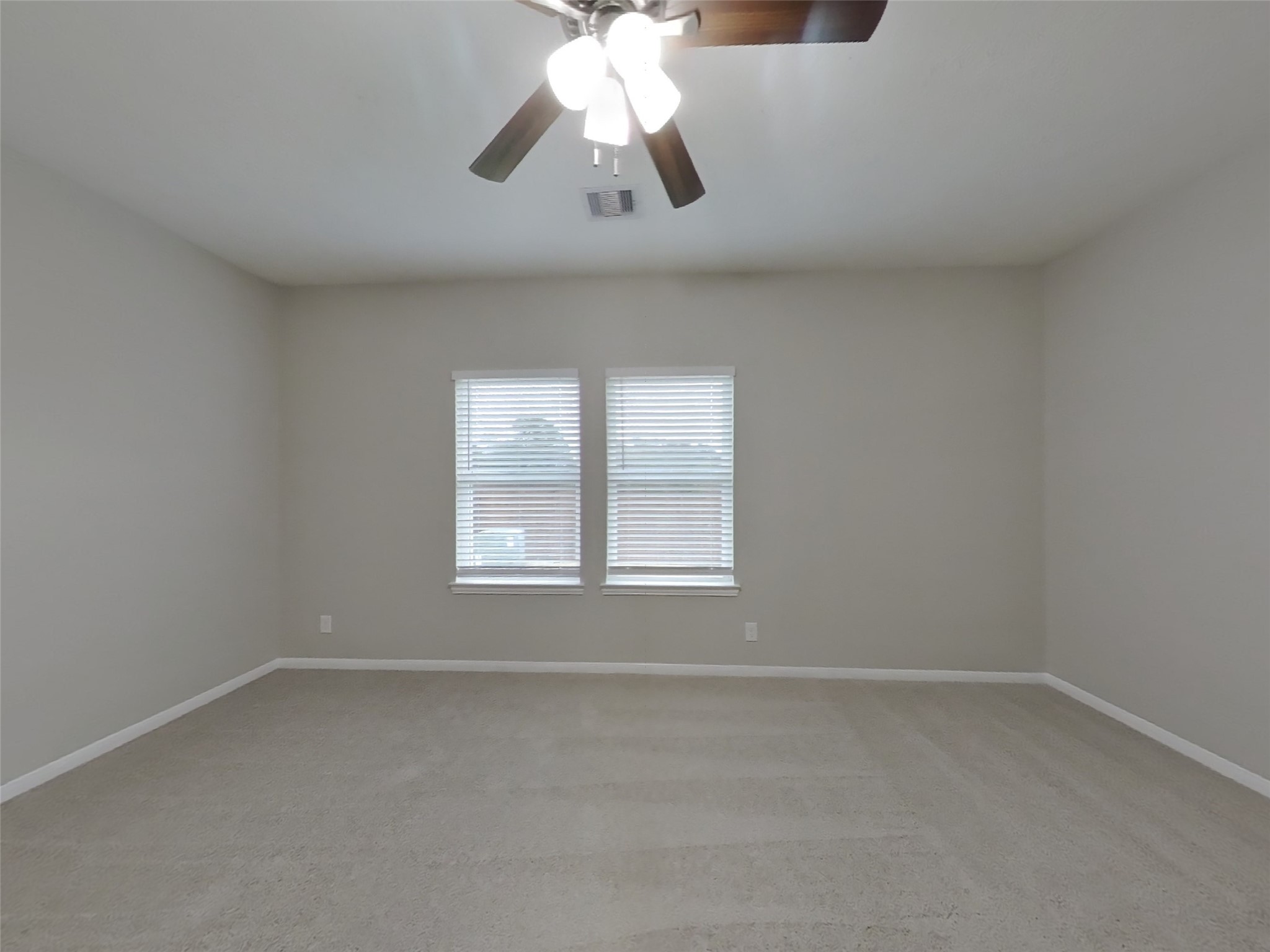 210 Pequin Road Crosby, TX 77532 - Photo 6 of 18 an empty room with a window
