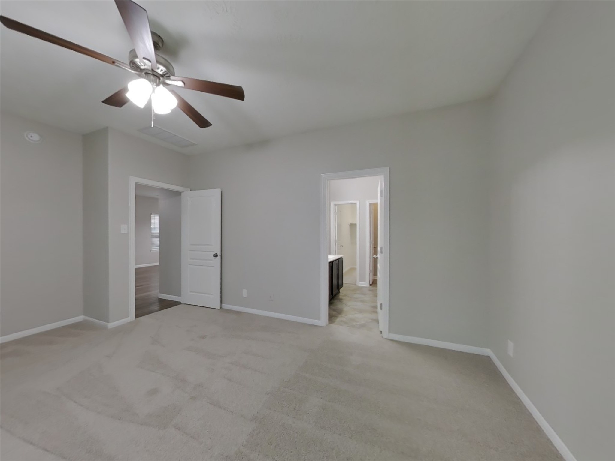 210 Pequin Road Crosby, TX 77532 - Photo 7 of 18 a view of an empty room and chandelier fan