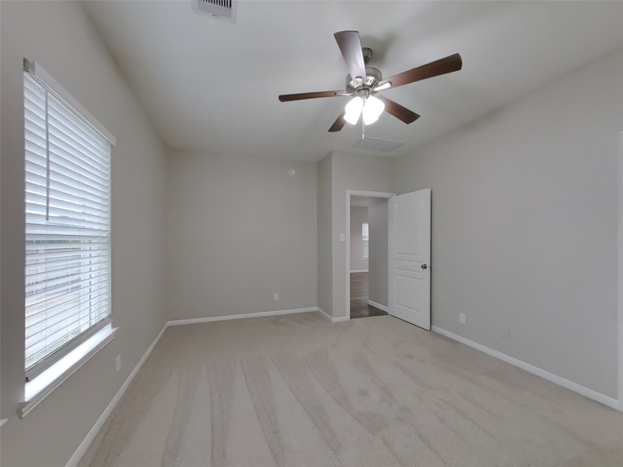 210 Pequin Road Crosby, TX 77532 - Photo 8 of 18 a view of an empty room with a window