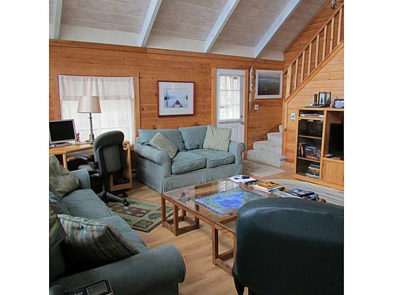 1623 Ridge Road Frye Island, ME 04084 - Photo 4 of 16 Living Room. Vaulted ceilings