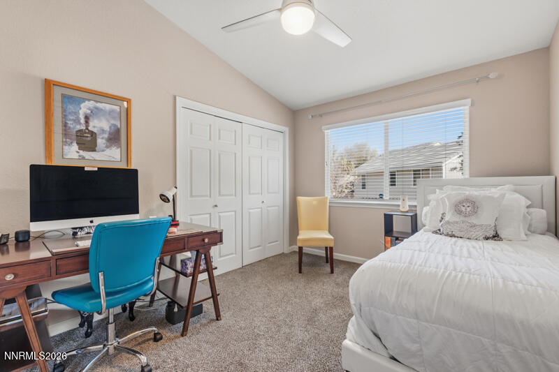 675 College Drive Reno, NV 89503 - Photo 23 of 30 a bedroom with a bed and a desk