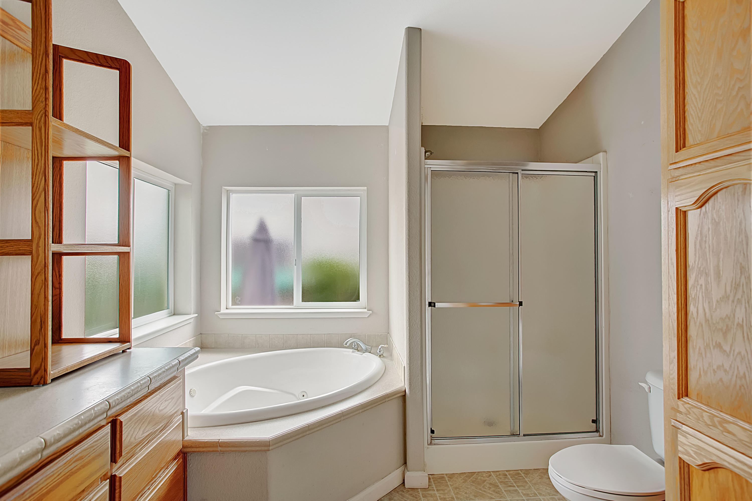 30 Winchester Canyon Road, Unit SPC 111 Goleta, CA 93117 - Photo 17 of 25 a bathroom with a granite countertop sink toilet and shower